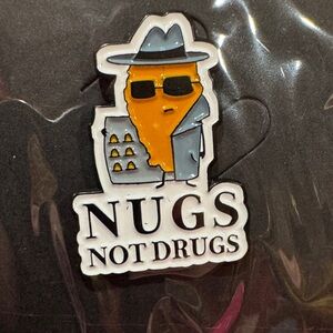 3 for $15 on select pins 
Orange and Gray Brooch